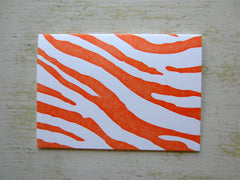 zebra orange folded notes