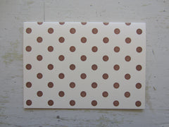 polka dot brown folded note on ecru
